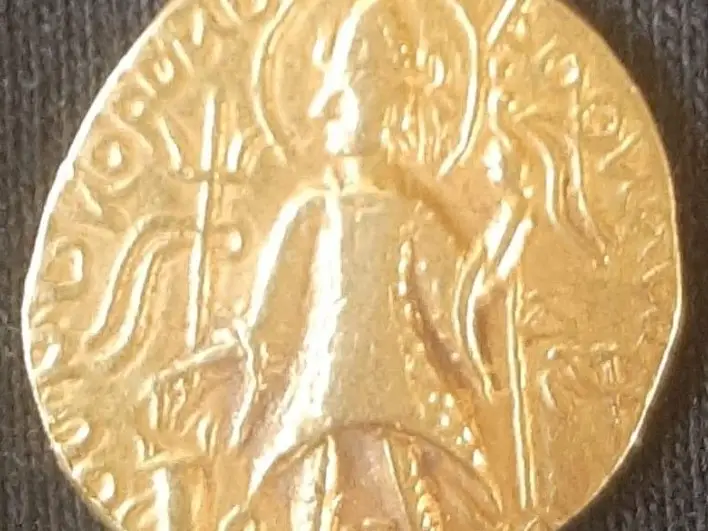 Ancient gold coin, Kushan-style standing figure