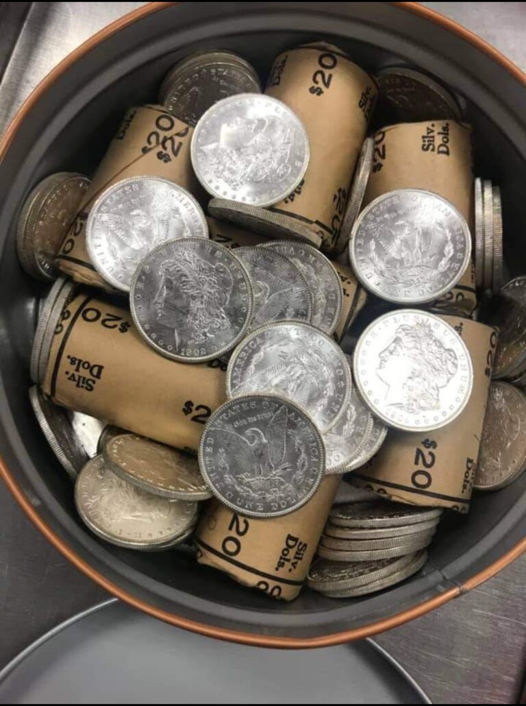 Bucket of silver coin rolls